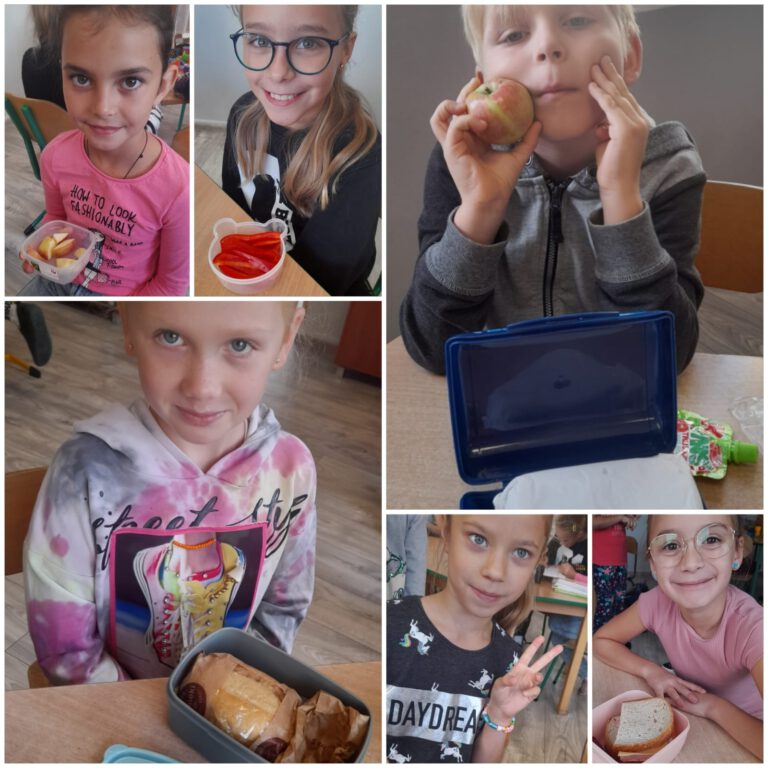 Uczniowie pokazują swoje zdrowe śniadania, owoce, warzywa i pieczywo