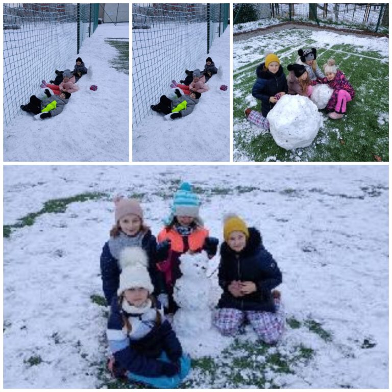 uczniowie bawią się na śniegu, między innymi lepią bałwana