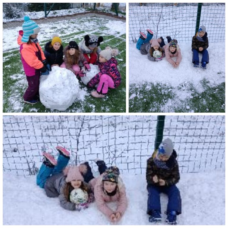 uczniowie bawią się na śniegu, między innymi lepią bałwana