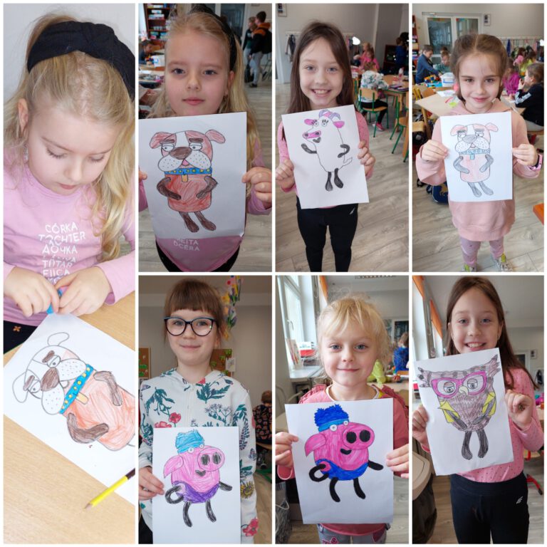 Dzieci pozują do zdjęcia ze swoimi pracami - pokolorowanymi bohaterami bajek