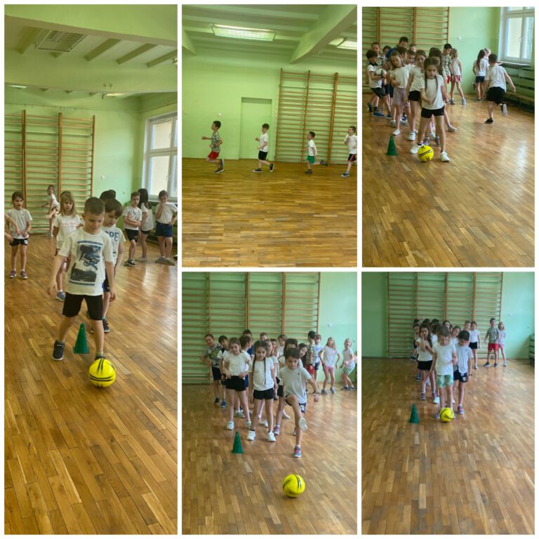 uczniowie ma sali gimnastycznej uczą się grać w piłkę nożną