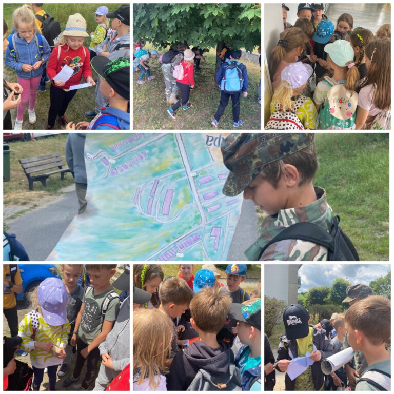 Dzieci z mapą szukają drogi do lasu