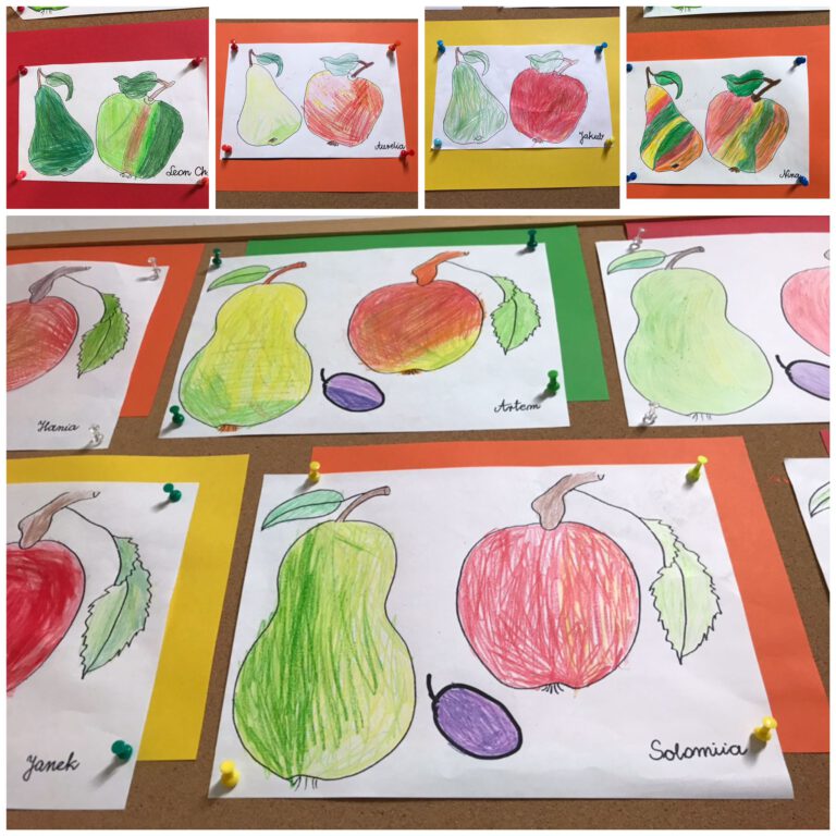 prace plastyczne uczniów, kolorowe warzywa i owoce namalowane na kartkach