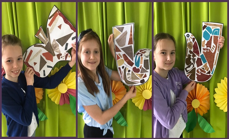 3 dziewczynki trzymają w rękach kolorowe kwiaty z papieru